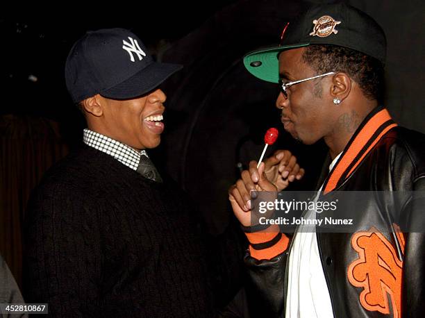 Jay-Z and Sean P.Diddy Combs during Sean P. Diddy Combs' Surprise 35th Birthday Party at Figa in New York City, New York, United States.