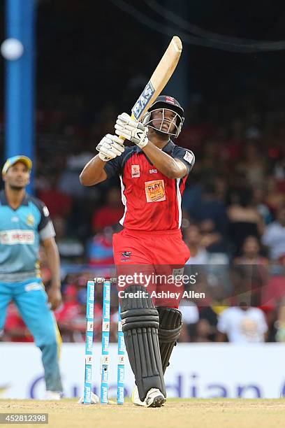 Evin Lewis hits a six down the ground during a match between The Trinidad and Tobago Red Steel and St. Lucia Zouks as part of the week 3 of Caribbean...