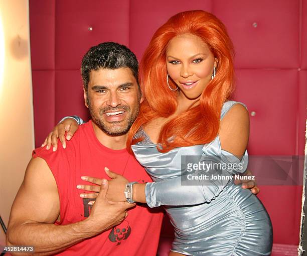 Photographer Mike Ruiz and Lil' Kim during Lil' Kim's Queen B Royalty Watch Photo Shoot at Black in New York City, New York, United States.