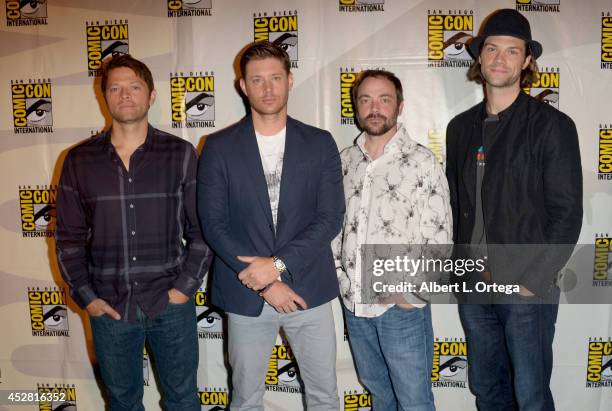 Actors Misha Colling, Jensen Ackles, Mark Sheppard and Jared Padalecki attend CW's "Supernatural" Panel during Comic-Con International 2014 at San...