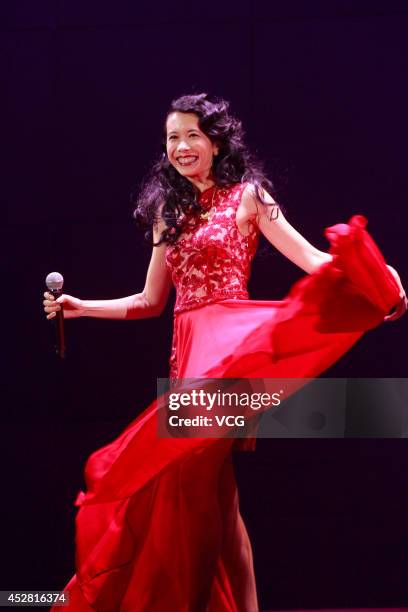 Singer and actress Karen Mok performs on the stage during Kepler World Tour 2014 on July 27, 2014 in Hong Kong, China.