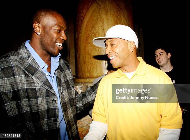 Terrell Owens and Russell Simmons during Coca Cola's Coke Side Of Life Launch Party at Capitale in New York City at Capitale in New York City, New...