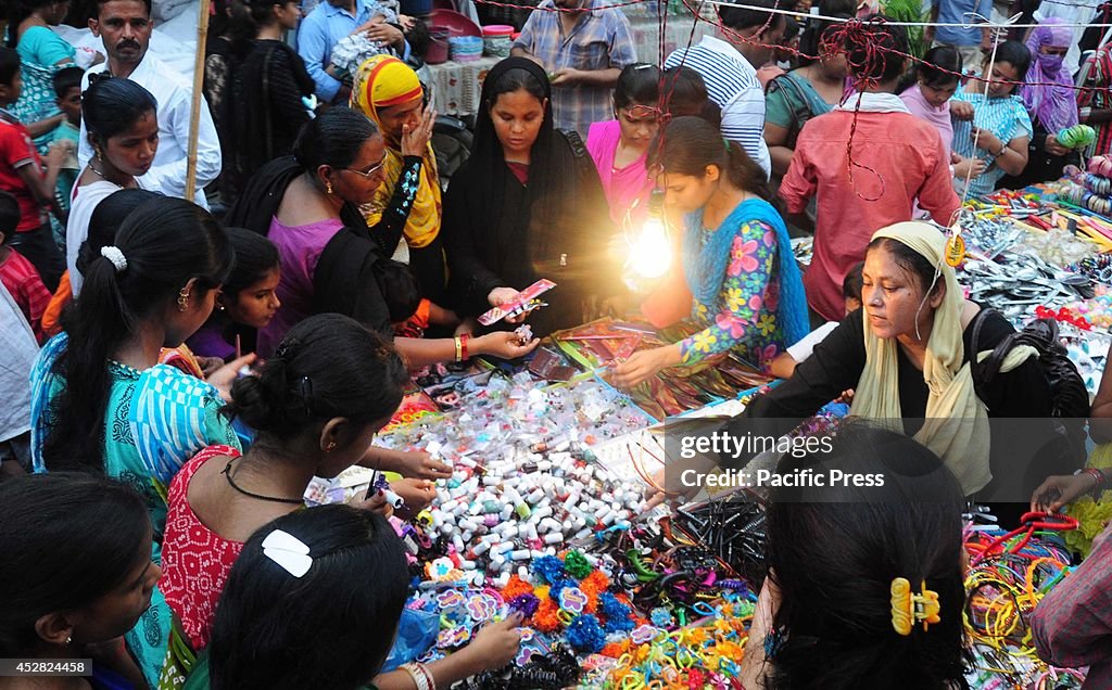 People busy shopping in the old city market  before the  Eid...