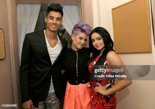 Recording artist Siva Kaneswaran, host Kelly Osbourne and actress Ariel Winter pose in the green room at the 2014 Young Hollywood Awards brought to...