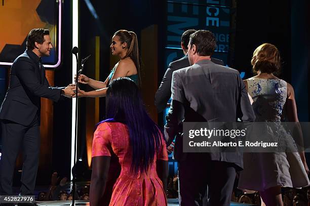 Dascha Polanco and the cast of 'Orange is the New Black' accept the award for Bingeworthy TV Show onstage at the 2014 Young Hollywood Awards brought...