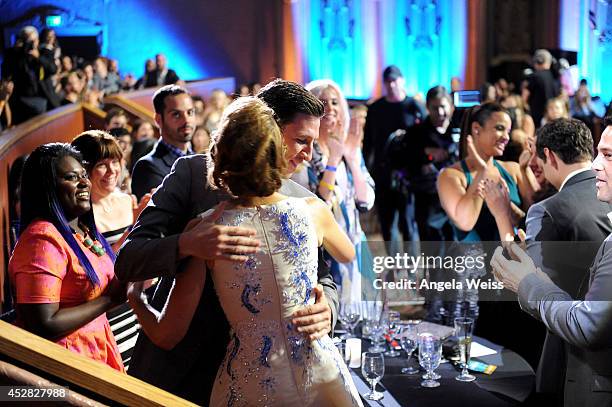 Actors Alysia Reiner and Pablo Schreiber in the audience at the 2014 Young Hollywood Awards brought to you by Samsung Galaxy at The Wiltern on July...