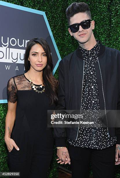 Rapper T. Mills and guest attend the 2014 Young Hollywood Awards brought to you by Samsung Galaxy at The Wiltern on July 27, 2014 in Los Angeles,...