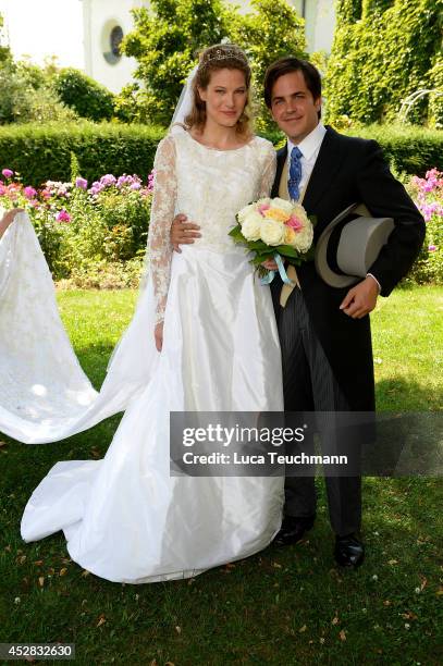 Theresa von Einsiedel and Prince Francois von Orleans depart from their wedding ceremony on July 26, 2014 in Straubing, Germany.