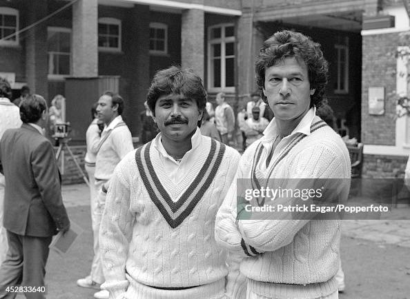 Javed Miandad and Imran Khan await a team photograph the day before ...