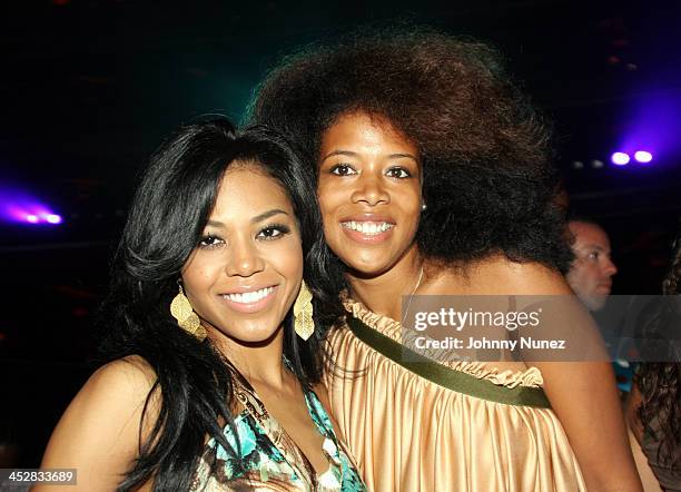 Amerie and Kelis during Olympus Fashion Week Spring 2006 - Baby Phat - Front Row and Backstage at Radio City Music Hall in New York City, New York,...