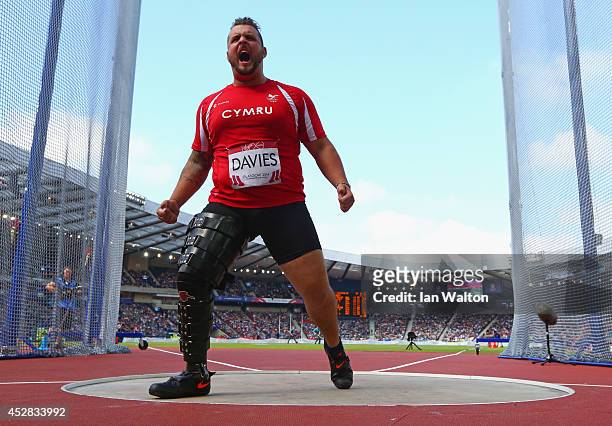 Aled Davies of Wales celebrates as he competes in the Men's F42/44 Discus final at Hampden Park Stadium during day five of the Glasgow 2014...