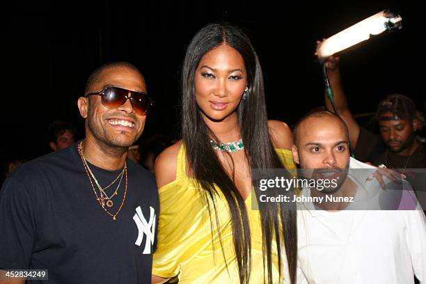 Maxwell, Kimora Lee Simmons and Richie Akiva during Olympus Fashion Week Spring 2006 - Baby Phat - Front Row and Backstage at Radio City Music Hall...