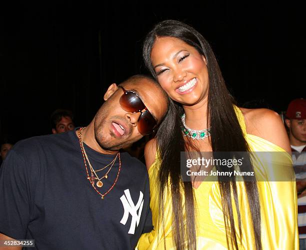 Maxwell and Kimora Lee Simmons during Olympus Fashion Week Spring 2006 - Baby Phat - Front Row and Backstage at Radio City Music Hall in New York...