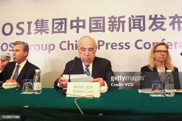 Sheldon Lavin , CEO of the OSI Group, and OSI president David McDonald attend a press conference over the recent expired meat scandal at Hengshan...