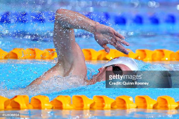 Ryan Cochrane of Canada competes in the Men's 1500m Freestyle Heat 3 at Tollcross International Swimming Centre during day five of the Glasgow 2014...