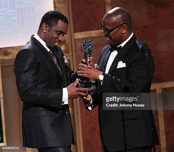 Andre Harrell presents Sean P. Diddy Combs with an award at the 3rd annual BET Honors at the Warner Theatre on January 16, 2010 in Washington, DC.