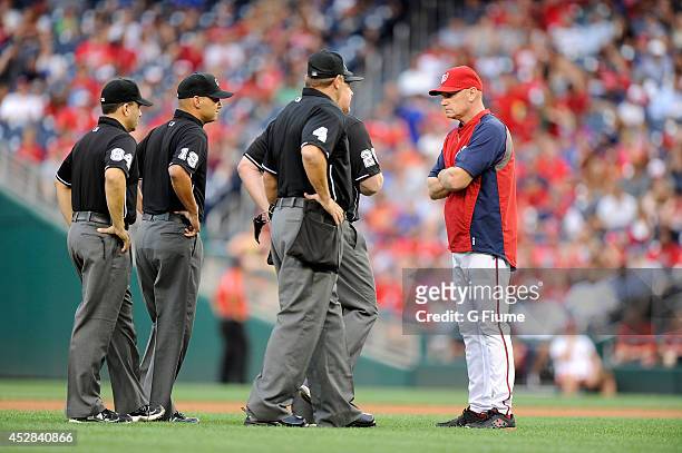 Manager Matt Williams of the Washington Nationals argues a call with the umpire crew in the first inning against the Milwaukee Brewers at Nationals...