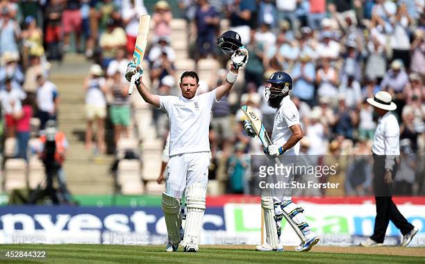 England batsman Ian Bell celebrates his century as Moeen Ali applauds during day two of the 3rd Investec Test at Ageas Bowl on July 28, 2014 in...