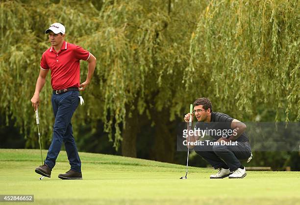 Sam Cowley and Timothy Cowley of Royal Ashdown Forest Golf Club line up a putt during the Golfbreaks.com PGA Fourball Championship - Southern...