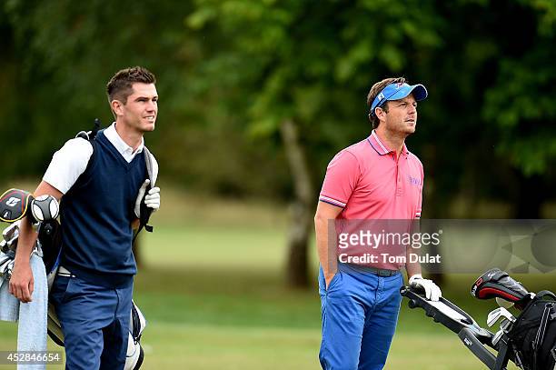 Benn Barham of PGolfCoaching@Pedham and Mark Trow of Kings Hill Golf Club look on during the Golfbreaks.com PGA Fourball Championship - Southern...