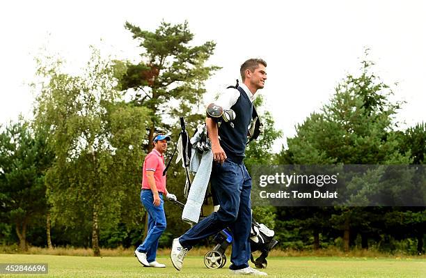 Benn Barham of PGolfCoaching@Pedham and Mark Trow of Kings Hill Golf Club walk along the fairway during the Golfbreaks.com PGA Fourball Championship...