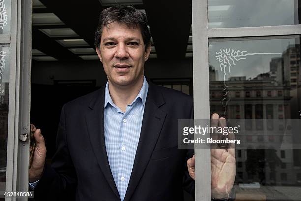 Fernando Haddad, mayor of Sao Paulo, stands for a photograph following an interview at City Hall in Sao Paulo, Brazil, on Thursday, July 10, 2014....