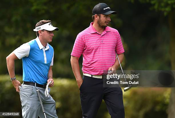 Benjamin Ross and Christopher Devonport of Windlesham Golf Club look on during the Golfbreaks.com PGA Fourball Championship - Southern Regional...