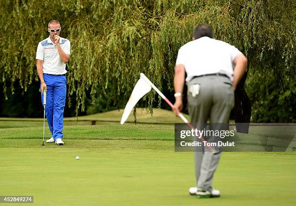 Michael Harrison of Chobham Golf Club lines up a putt during the Golfbreaks.com PGA Fourball Championship - Southern Regional Qualifier at Woodcote...