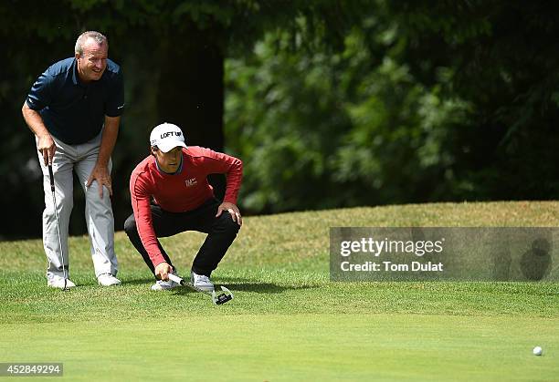 Christopher Reed and Peter Hammond of Shanklin & Sandown Golf Club line up a putt during the Golfbreaks.com PGA Fourball Championship - Southern...