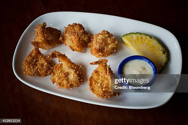 Coconut shrimp dish is displayed for a photograph at a Red Lobster restaurant in Yonkers, New York, U.S., on Thursday, July 24, 2014. Darden...