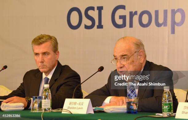 Group CEO Sheldon Lavin and president David McDonald attend a press conference on July 28, 2014 in Shanghai, China. Shanghai Husi Food Co Ltd,...