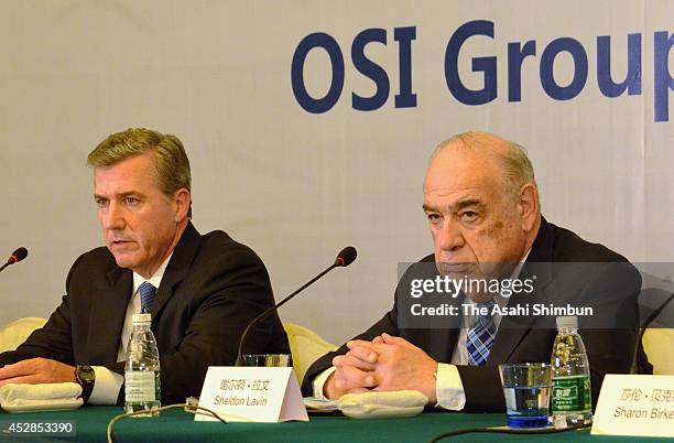 Group CEO Sheldon Lavin and president David McDonald attend a press conference on July 28, 2014 in Shanghai, China. Shanghai Husi Food Co Ltd,...