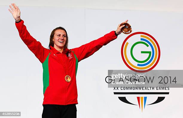 Gold medallist Jazz Carlin of Wales celebrates during the medal ceremony for the Women's 800m Freestyle Final at Tollcross International Swimming...