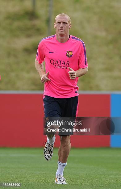 Jeremy Mathieu of Barcelona warms up during the Barcelona Training Session at St George's Park on July 28, 2014 in Burton-upon-Trent, England.