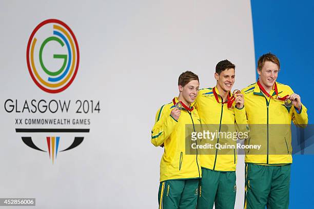 Gold medallist Mitch Larkin of Australia poses with silver medallist Josh Beaver of Australia and bronze medallist Matson Lawson of Australia during...