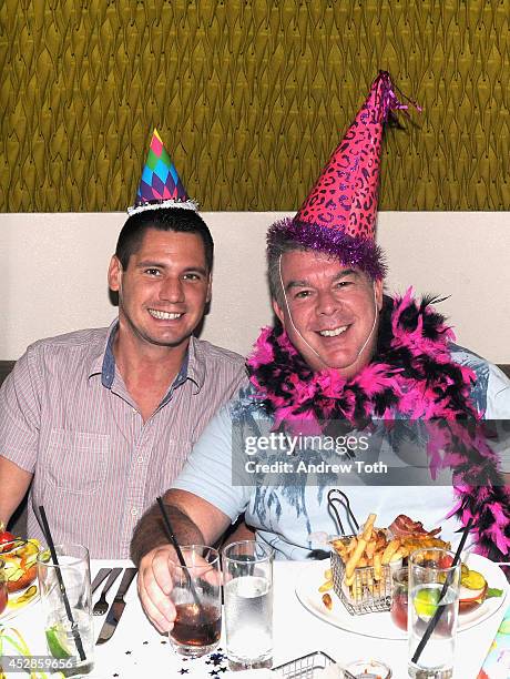 Radio host Elvis Duran and Alex Carr attend Elvis Duran's Birthday Lunch at David Burke Kitchen at the James Hotel on July 28, 2014 in New York City.