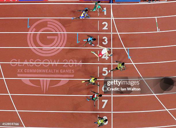 Bronze medalist Nickel Ashmeade of Jamaica, Antoine Adams of St Kitts and Nevis, Jason Livermore of Jamaica, Gold medalist Kemar Bailey-Cole of...