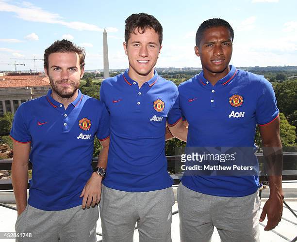 Juan Mata, Ander Herrera and Antonio Valencia of Manchester United meet tennis players who are playing in the Citi Open, at their hotel on July 28,...