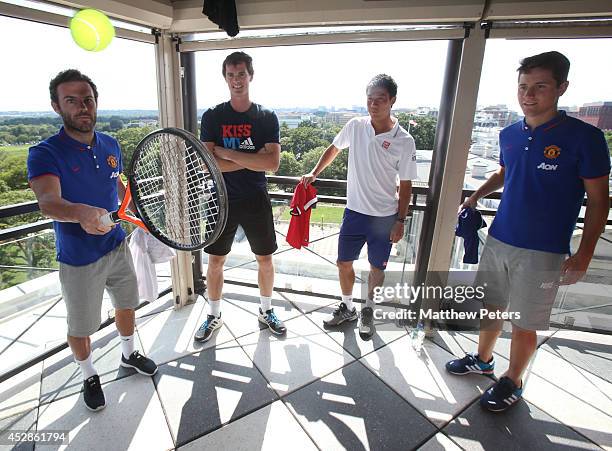 Juan Mata and Ander Herrera of Manchester United meet tennis players Kei Nishikori and Jamie Murray who are playing in the Citi Open, at their hotel...