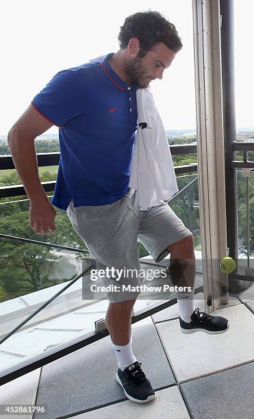 Juan Mata of Manchester United meets tennis players who are playing in the Citi Open, at their hotel on July 28, 2014 in Washington, DC.