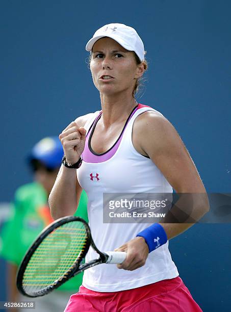 Varvara Lepchenko of the USA reacts after winning a point during her match against Caroline Garcia of France during Day 1 of the Bank of the West...