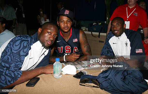 Players Dwyane Wade, Carmelo Anthony and Kobe Bryant attend the U.S. Olympic Men's Basketball Team unveiling of their new team look to fans at the...