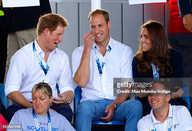 Prince Harry, Prince William, Duke of Cambridge and Catherine, Duchess of Cambridge watch the Wales v Scotland Hockey match at the Glasgow National...