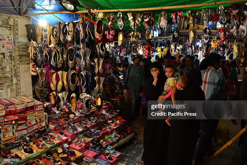 Indian Muslim lady customers shopping for shoes in Allahabad...