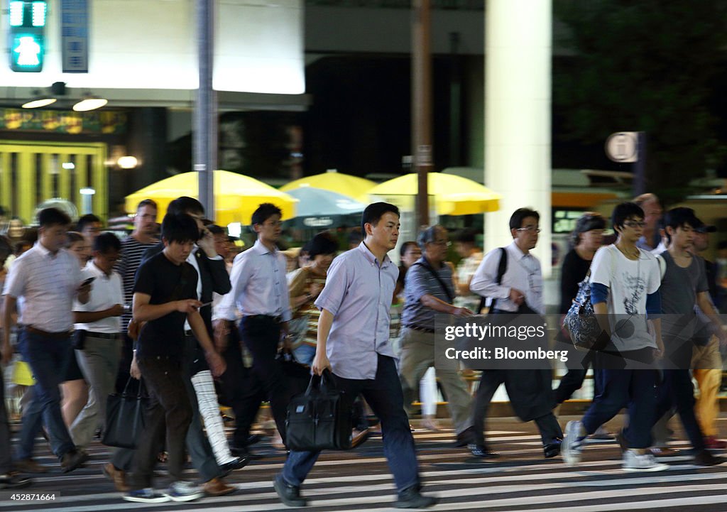 Workers In Central Business District As Japan Releases Jobless Rate Figures