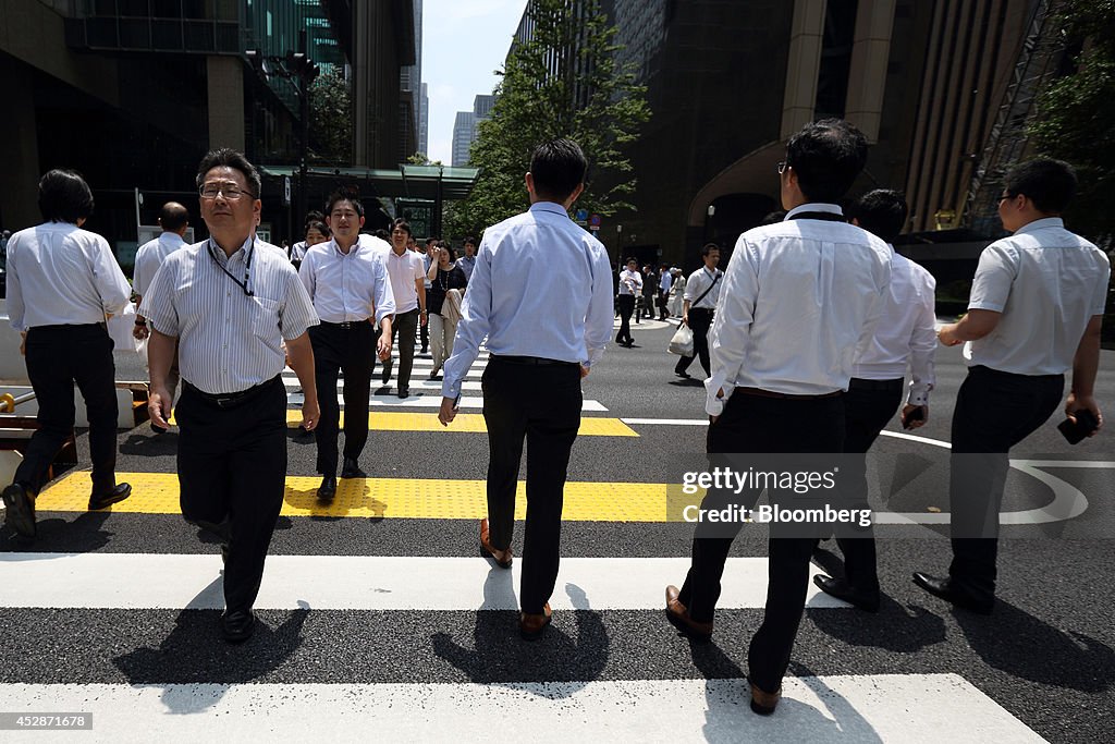 Workers In Central Business District As Japan Releases Jobless Rate Figures