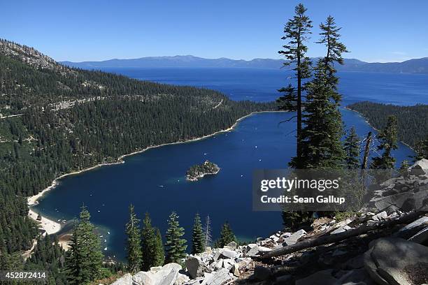 Emerald Bay lies under blue skies at Lake Tahoe on July 23, 2014 near South Lake Tahoe, California. Lake Tahoe is among Califonria's major tourist...