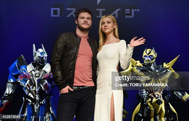 Hollywood actress Nicola Peltz and actor Jack Reynor pose for photographers during a press conference to promote their latest movie "Transformers:...