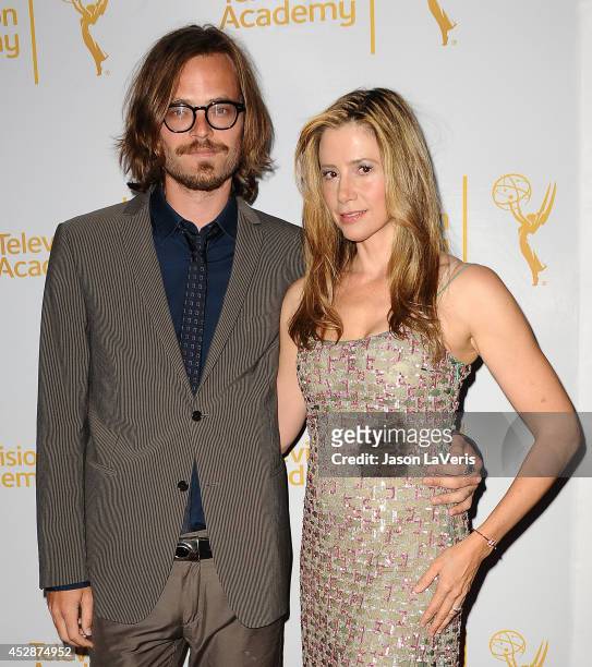 Actor Christopher Backus and actress Mira Sorvino attend the Television Academy's performers peer group celebrating the 66th Emmy Awards at Montage...