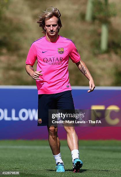 Ivan Rakitic of Barcelona in action during a Barcelona Training Session at St Georges Park on July 29, 2014 in Burton-upon-Trent, England.